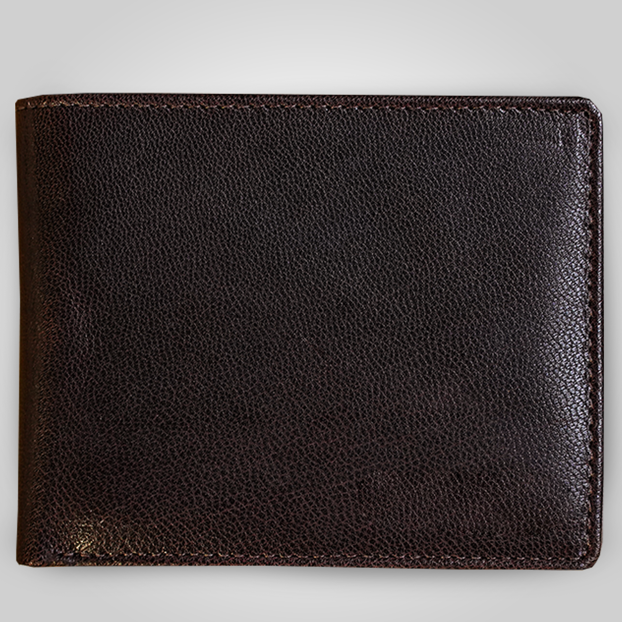 Black leather wallet on a light gray background