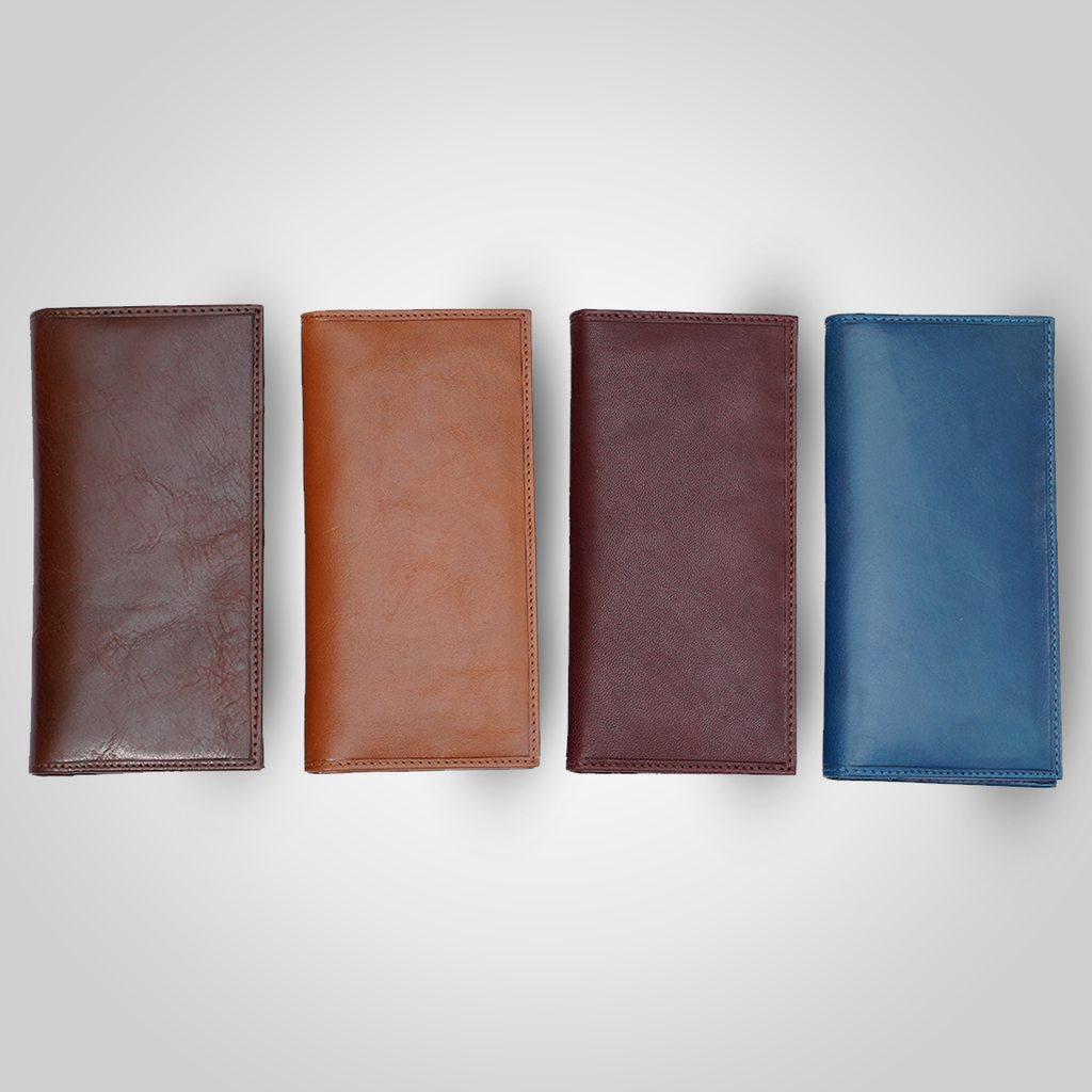 Four leather wallets in different colors arranged on a light gray background