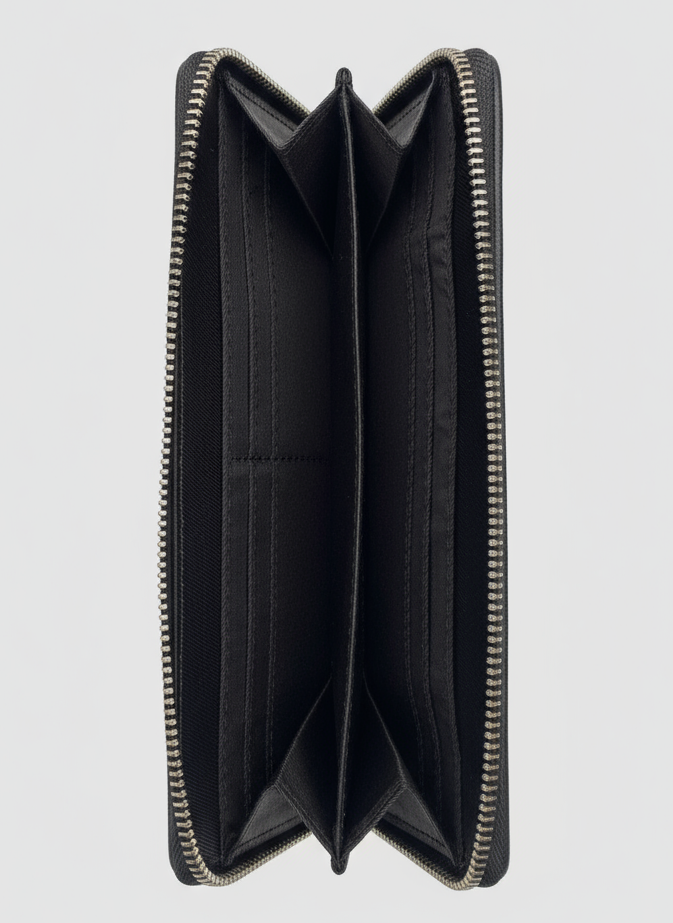 Black wallet with a zipper on a light gray background