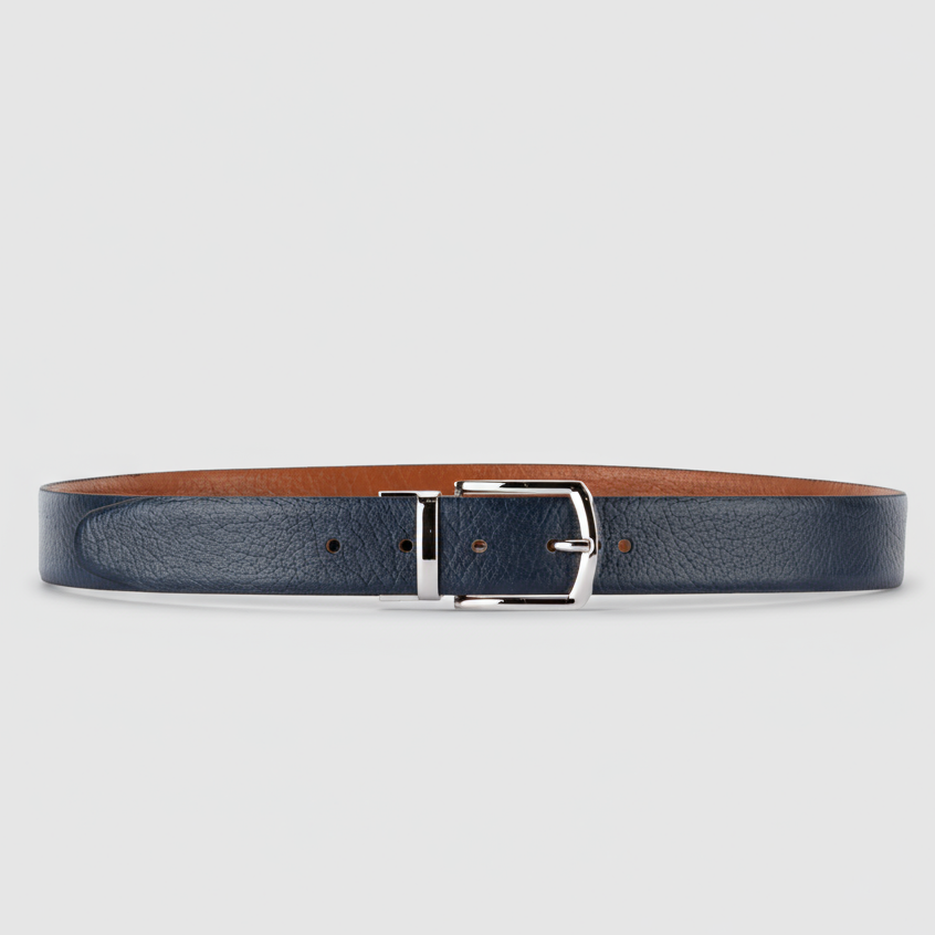 Navy Reversible leather belt with a silver buckle on a light gray background