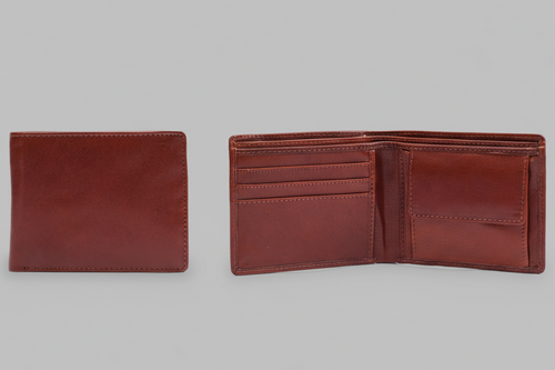 Tan leather wallet open and closed on a gray background